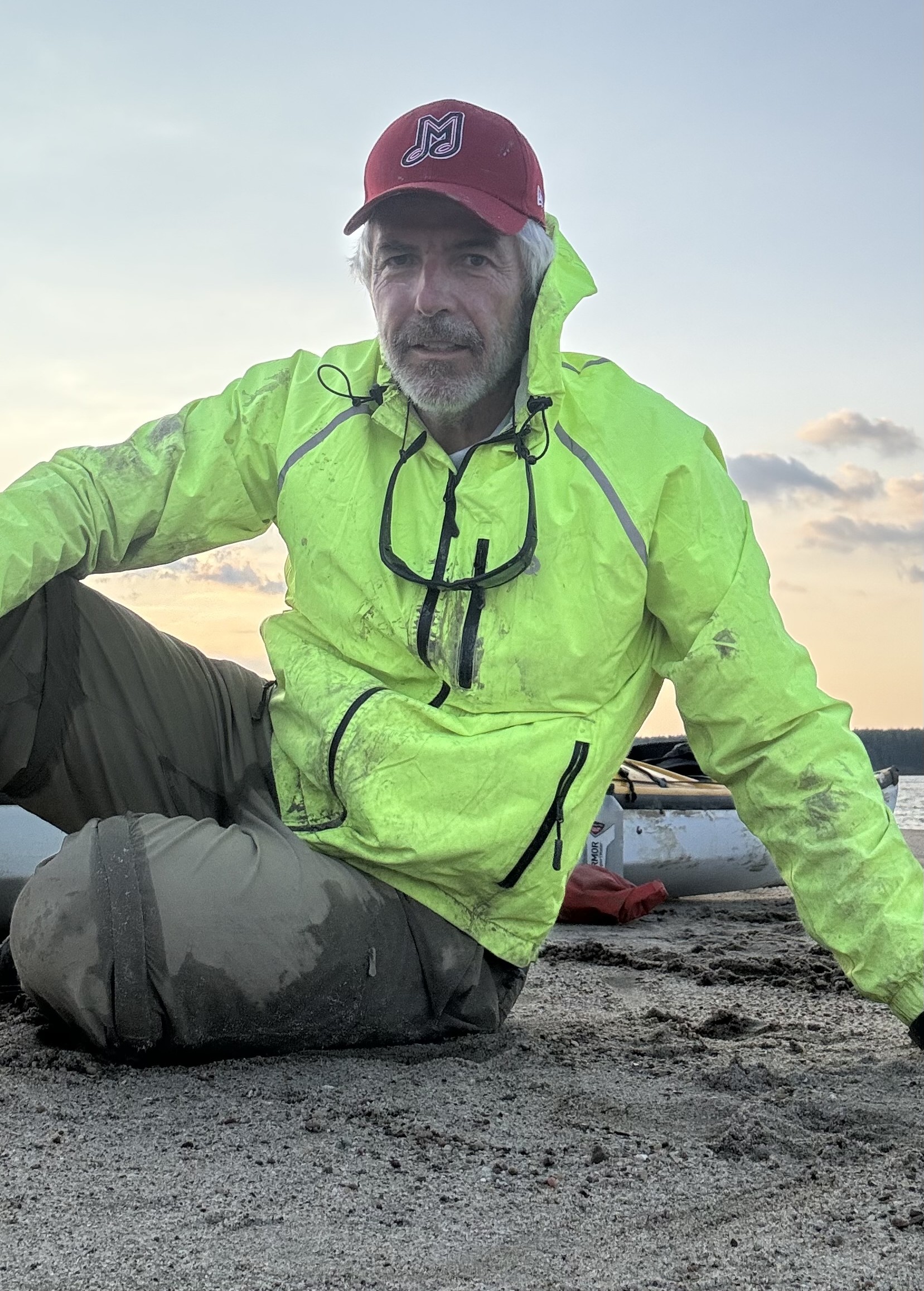 Author Paul Mellor poses on the shore.